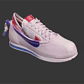 White Sneakers With Red And Blue Accents On Tongue Laces And Soles