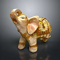 Decorative Gold And White Elephant Figurine With Ornate Design Details