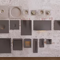 Modern Wall Decor Pieces In Gray White With Various Shapes On Textured Wall