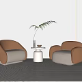 Casual Sofa Set Beige and Brown Armchairs with Small Round Table Plant Light Wall Rug