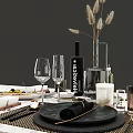 Elegant Dinnerware Set on Marble Tabletop with Black Plates Golden Cutlery Glassware and Accessories
