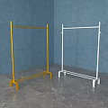 Simple Yellow And White Clothes Racks With Blue Wall And Gray Floor