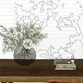 Silver Gray Gradient Vase With White Flowers And Green Leaves On Wooden Table