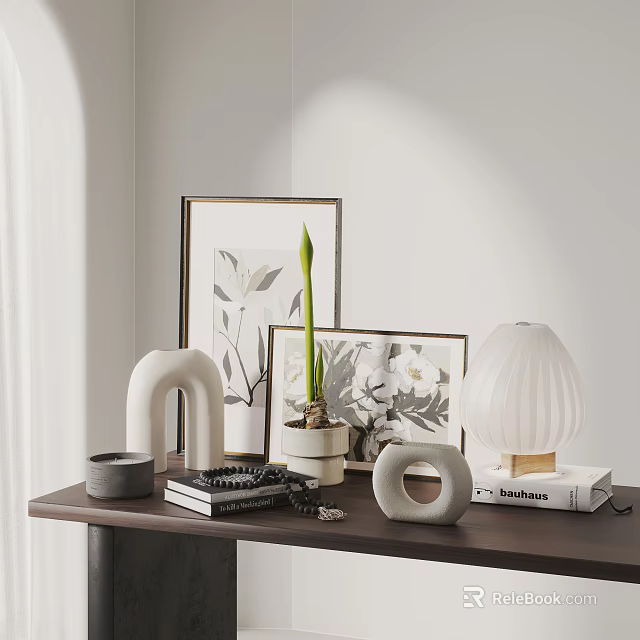 Decorative Ornament Set with Framed Art Potted Plant White Lamp and Sculptural Objects on Tabletop 3d model 