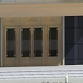 Wooden Entrance Doors With Glass Panels On Dark Wall Building Entrance With Steps