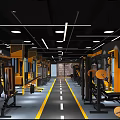 Modern Gym Interior Featuring Yellow Black Fitness Equipment Central Track Ceiling Lights And Mirror Walls