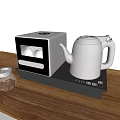 Stylish Kitchen Countertop With Silver Electric Kettle Coffee Maker And Glass Jar
