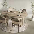 Modern Oval Wooden Dining Table Set With Rattan Chairs Round Rug And Green Plants