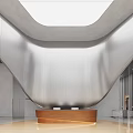 Modern Reception Area Design With Wooden Desk Silver Pillars And Curved Walls