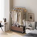 White Clothing Rack With Hanging Clothes Orange Drawer And Plush Toys For Bedroom Storage