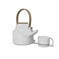 Modern Tea Set With Concrete Teapot And Mug Featuring Speckled Texture And Wooden Handle