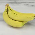 Fresh Yellow Bananas Arranged On Clean Marble Surface For Healthy Snack