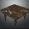 Vintage Wooden Table With Worn Tabletop And White Patches On Carved Wooden Legs