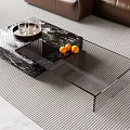 Modern Glass And Marble Coffee Table With Tray Of Glasses And Oranges In Living Room