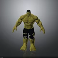 Hulk Toy With Green Skin Muscular Build Black Torn Shorts Standing Pose On Gray Background