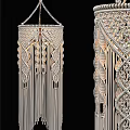 Handmade Macramé Chandelier With Intricate Knot Patterns And Tassel Details