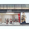 Modern Fashion Clothing Store Interior With Mannequins Red Decor Clothing Racks Display Tables and Lighting