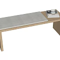 Simple Wooden Ottoman With Padded Seat And Stacked Magazines On Top