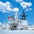 Modern Naval Warship With Hull Number 138 And Red Flag Under Blue Sky With White Clouds