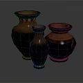 Three Decorative Clay Vases In Various Sizes With Dark Brown Orange Hues