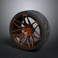 Modern Alloy Car Wheel With Orange Accent Rims And Black Tire Design Features