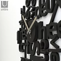 Umbra Stylish Modern Black Wall Clock With Multilingual Number Words Design