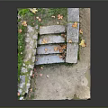 Natural Stone Steps And Walls Decorated With Moss And Scattered Fallen Leaves
