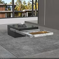 Modern Black Marble Coffee Table With Layered Tray Design In Bright Room