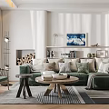 Modern Living Room Interior With Green Sofa Multiple Pillows Round Coffee Table And Fireplace