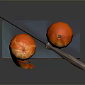 Fresh Peeled and Whole Tangerines with Silver Knife on Blue Platform Against Dark Background
