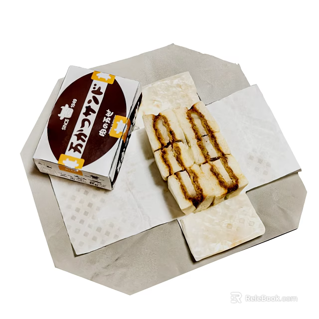 Japanese Sweet Tamagoyaki Rolled Omelette Sliced With Package On Paper Towel 3d model 