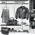 Fashion Clothes Displayed Black Leather Jacket Silver Pleated Skirt Black Handbag White Sneakers on Shelf