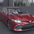 Red Toyota Sedan Modern Exterior Design With LED Headlights And Alloy Wheels