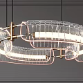 Modern Transparent Glass Circular Chandelier With Warm LED Lighting Against Gray Wall Background