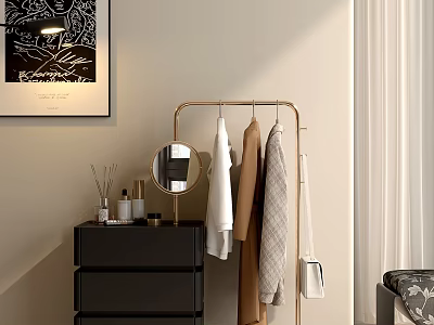 Golden Clothes Rack With Hanging Clothes And Black Drawer Cabinet In Bedroom 3d model