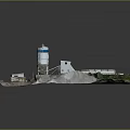 Industrial Silo Facility With Multiple White Silos Heavy Equipment And Gravel Yard