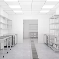 Modern Commercial Kitchen With Stainless Steel Worktables Cabinets And Ventilation