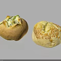 Freshly Baked Bread Loaves With Green Herbs And Cheese Toppings Golden Crust