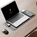 Wooden Oval Desk with Laptop Mouse Table Lamp Headphones and Matching Chair Featuring Fluted Legs