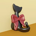 Black Cat Ornament With Large Red Bow Photo Spot On Light Yellow Brown Gradient Background