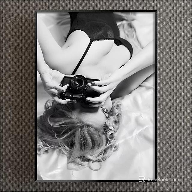 Black and White Figure Painting of Woman Lying on Bed Holding Camera 3d model 