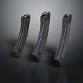Three Shiny Metal Weapon Magazines For Firearm Use And