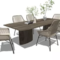 Modern Wooden Long Table with Rattan Chairs and Green Plants Centerpiece