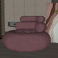 Pink Round Velvet Single Sofa in Modern Living Room with Stylish Decor and Green Plants