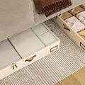 Under Bed White Storage Bins with Handles Holding Neatly Folded Clothes in Bedroom