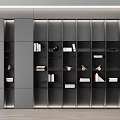 Modern Gray Bookcase With Open Shelves Featuring Books Decorative Items And Potted Plant Interior Design