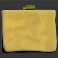 Yellow Cube Shaped Food With Green Herbs And Olive Topping On Textured Surface