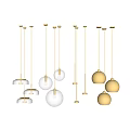 Modern Gold Hanging Pendant Lights With Transparent Shades And Various Design Styles