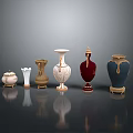 Carved Sculptural Vases With Various Colors And Ornate Decorative Details