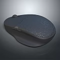 Modern Wireless Computer Mouse With Gray Mesh Texture Surface And Ergonomic Design